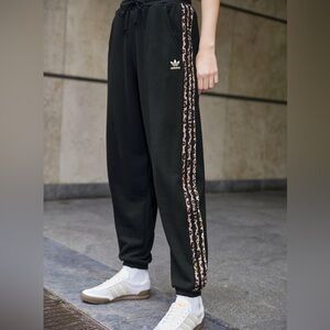 Adidas Originals terry jogger with leopard print three stripes - black